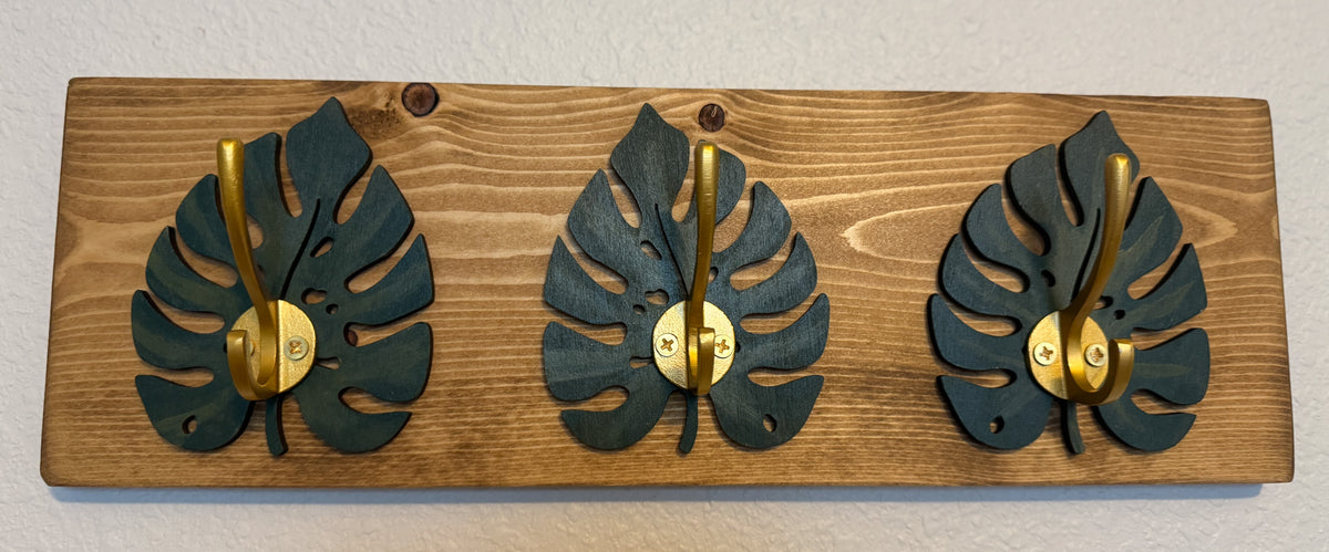Side view of monstera leaf hook rack showing depth and hooks
